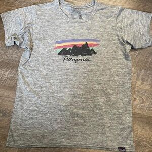 Next womens Patagonia Capilene Cool, 50+UPF, stretch performance shirt. …